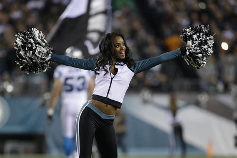 A Philadelphia Eagles cheerleader performs during the first half of an ...