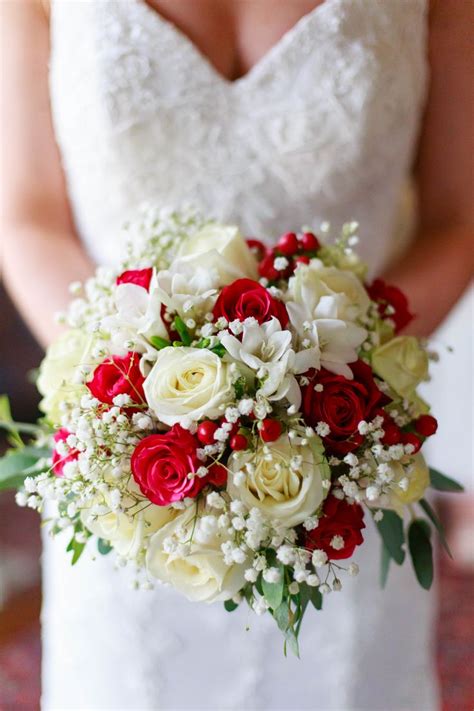 white and red bridal bouquet of beautiful roses , baby's breath and freesias @chateaulagorce www ...