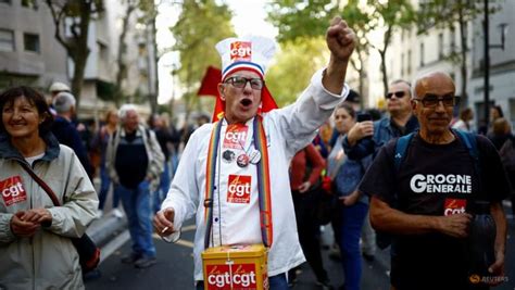 Thousands take to the streets of Paris to protest soaring prices - CNA