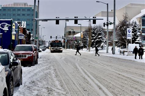 Crossing the street in downtown Anchorage - Alaska Public Media