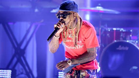 Lil Wayne concert ends after crowd panics over false gunshot reports | Fox News