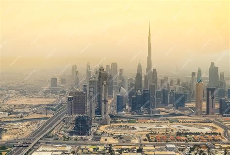 Premium Photo | Aerial view from helicopter of the Dubai skyline and ...