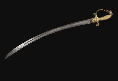 A BRONZE-GILT TIPUESQUE TIGER-HILTED SWORD, INDIA, EARLY 19TH CENTURY Swords And Daggers, Knives ...