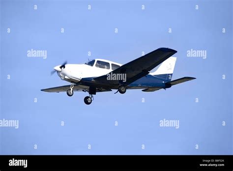 Aircraft Airplane Blue sky Flying In Flight Plane Stock Photo - Alamy