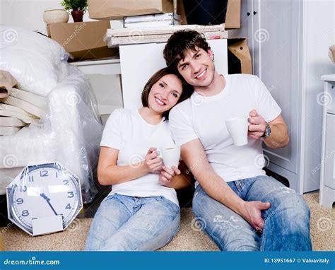 People relax in new home stock image. Image of happiness - 13951667