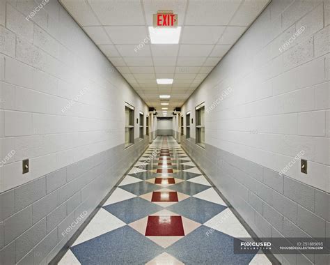 Hospital hallway with patterned floor and lights — abandoned, sparse ...