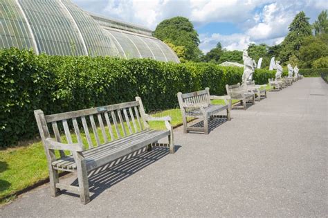 Benches in a public park stock photo. Image of blue, path - 20660686