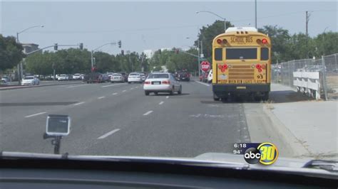 Some drivers failing to stop for buses as red lights flash putting children in danger - ABC30 Fresno