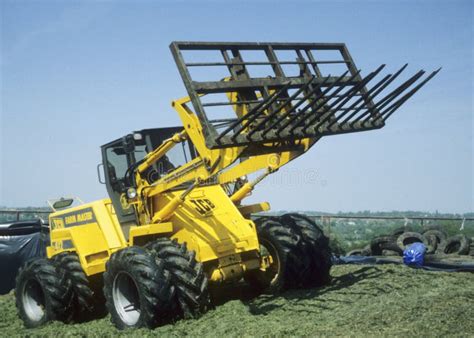 Agricultural Farm Tractor with Front Loader Editorial Photography ...