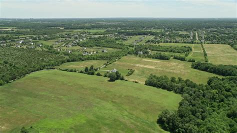 4.8K stock footage aerial video of rural homes and green fields, Franklin Park, New Jersey ...