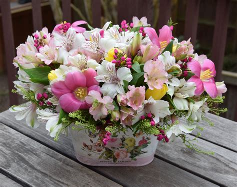 Easter flower arrangement with tulips and alstroemerias Easter Flower Arrangements, Easter ...