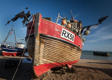 Hastings Beach | Fishing boat at sunset on Hastings Beach, W… | Flickr