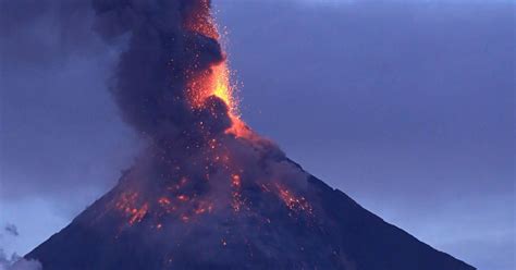 Mount Mayon volcano in the Philippines erupts with lava and ash