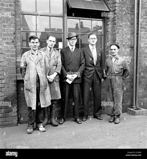 1950s, England. Male Workers and management at the Ever Ready Battery ...