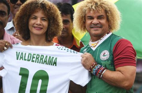 Former Colombian footballer Carlos Valderrama, who played in three World Cup tournaments, poses ...