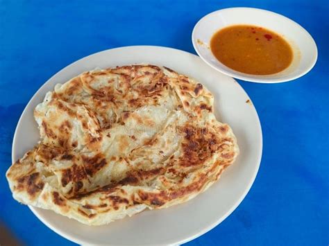 Roti canai with curry stock photo. Image of dinner, crispy - 113407446