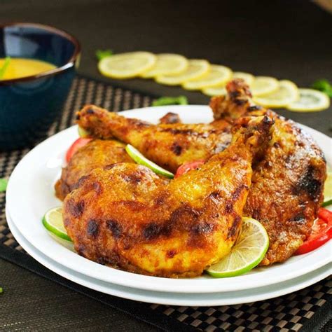 Ayam Percik, a popular Malaysian dish. Roasted chicken marinated in ...