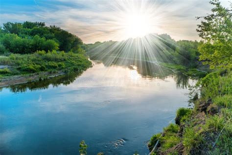 Sunset over river stock photo. Image of reflection, silhouette - 95862184