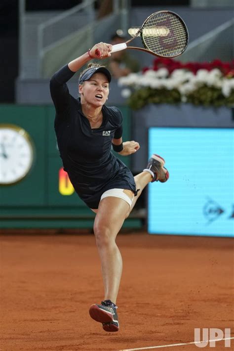 Photo: Kudermetova of Russia returns a shot during the Mutua Madrid Open in Madrid ...