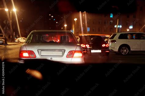 Night view of the cars. the road in the city at the night with yellow ...