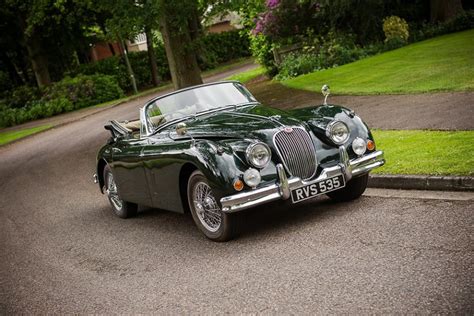 Jaguar XK150 in British Racing Green | Jaguar, Automobile