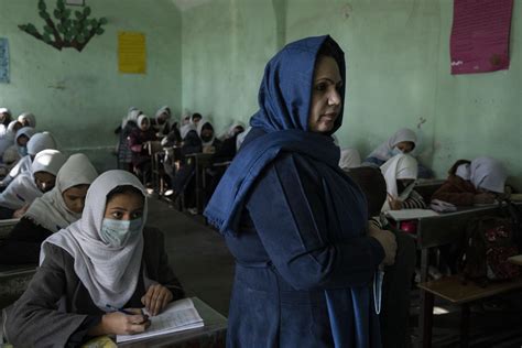 Unique effort reopens girls' schools in an Afghan province | AP News