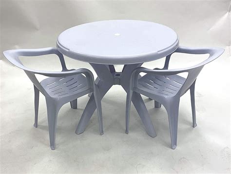 White Plastic Garden Furniture - Round Table, 2 x Statted Chairs