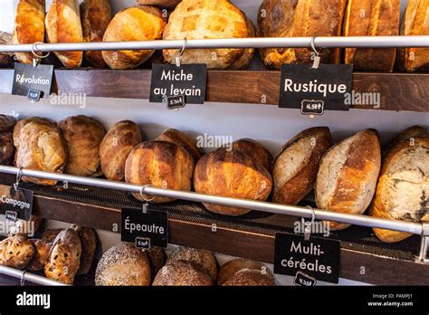 French bakery display with different kinds of bread loaves Stock Photo - Alamy