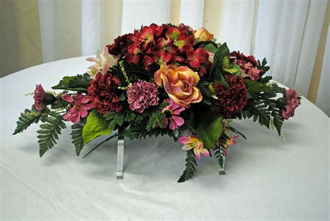 Saddle for a headstone | Memorial flowers, Funeral flower arrangements ...