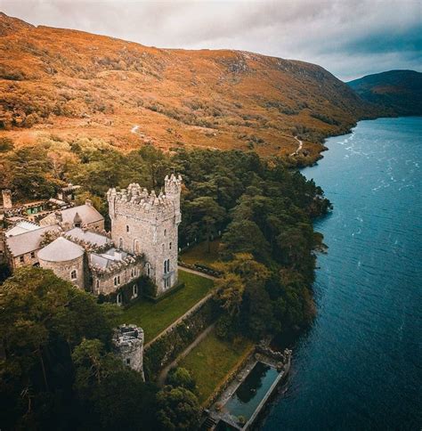 The beautiful Glenveagh Castle on the shores of Lough Neagh County Donegal . . . . Photo by ...