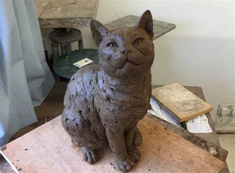 Bronze Sitting Cat sculpture by animal sculptor Tanya Russell, MRBS