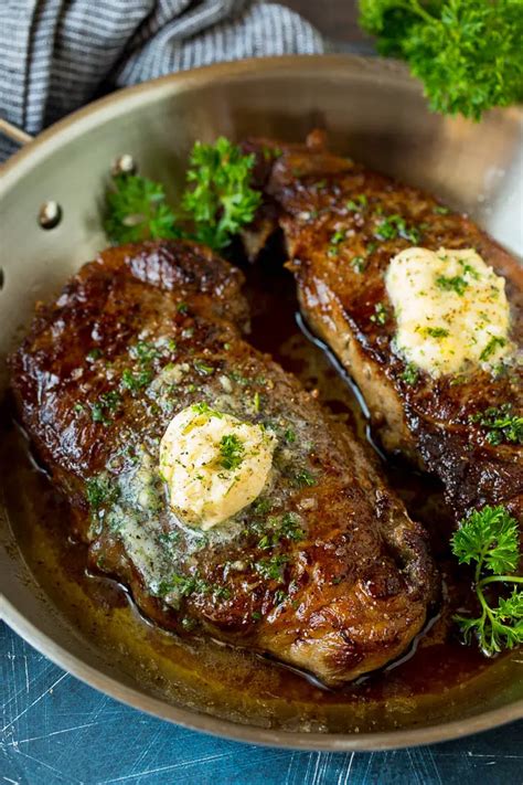 Sirloin steak seared to perfection and topped with garlic and herb ...