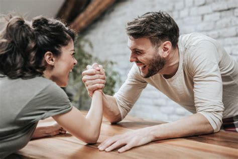 Man Vs Woman Arm Wrestling Stock Photos, Pictures & Royalty-Free Images ...