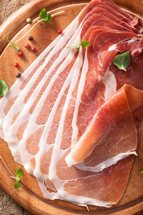 sliced prosciutto ham on chopping board with oregano and pepper By duskbabe鈥檚 photos #Ad , # ...