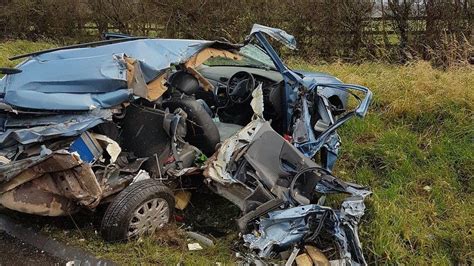 Driver's lucky escape after car crushed in crash - BBC News