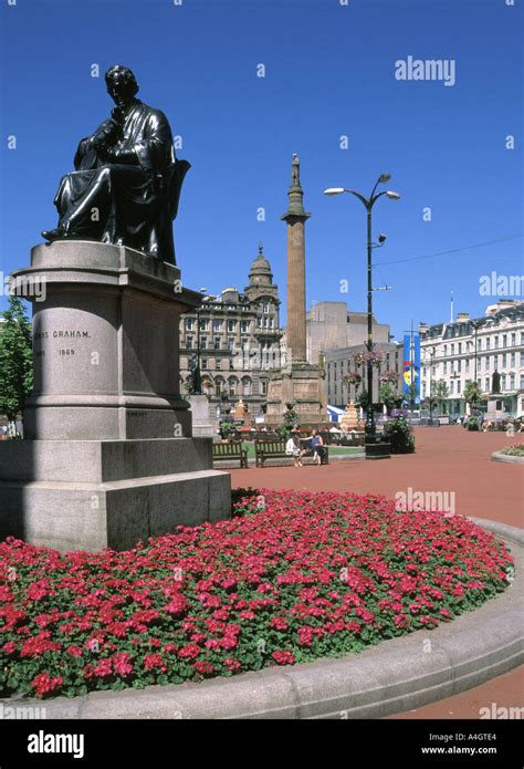 Historic George Square Glasgow flowers & statue of chemist Dr Thomas Graham with Sir Walter ...