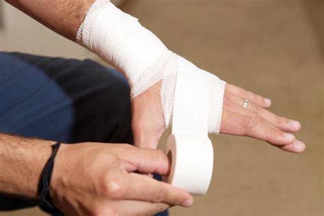 How to Wrap a Wrist With Athletic Tape | LIVESTRONG.COM