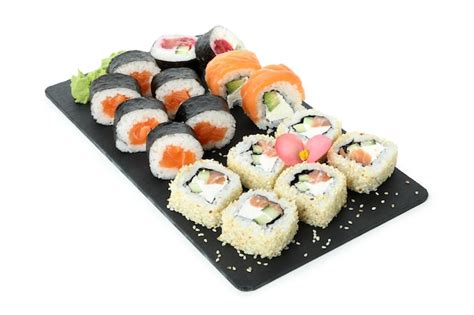 Premium Photo | Slate board with sushi set isolated on white background