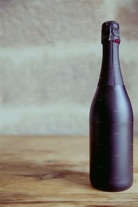 black champagne bottle | High-Quality Food Images ~ Creative Market