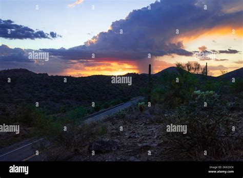 Sunset view of road and mountains at Lake Pleasant Regional Park, in Maricopa, Arizona Stock ...