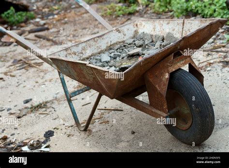 rubble, wheelbarrow, rubbles, wheelbarrows Stock Photo - Alamy