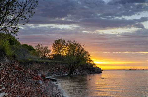 Red Rock Beach Sunrise | Sunrise beach, Landscape photos, Lakeside park