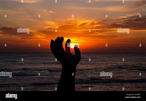 sunrise over the Giant hand at homigot beach, Pohang, South Korea Stock Photo - Alamy