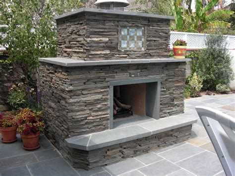 Bluestone fireplace | Exterior fireplace, Outdoor fireplace, Patio spaces