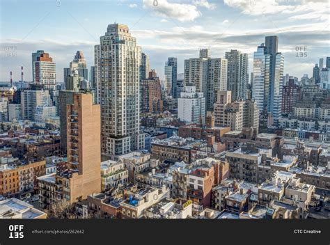 Residential buildings and skyscrapers in a city skyline stock photo - OFFSET