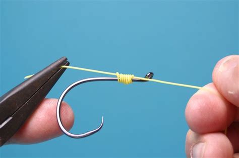 Step 7 - How To Tie The Snell Knot | Snell knot, Sea fishing, Sea angling