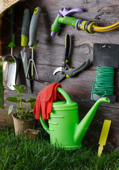 Gardening tools and equipment closeup in the backyard. | High-Quality ...