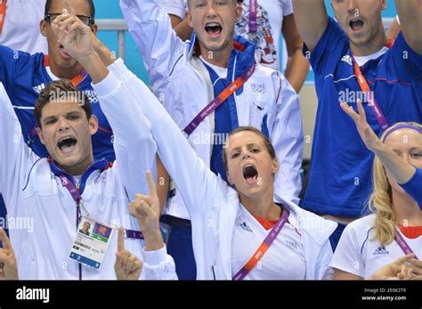 France's Florent Manaudou (L) and his sister Laure Manaudou celebrate ...