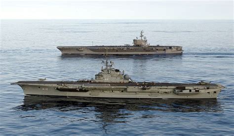 Brazilian aircraft carrier NAe São Paulo, foreground, and U.S. Navy carrier USS Ronald Reagan ...