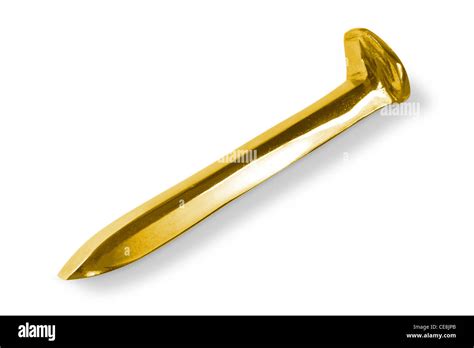 Golden railroad spike Stock Photo - Alamy